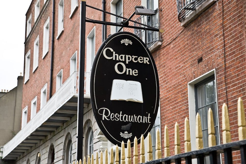 Restaurant signage written "Chapter One"