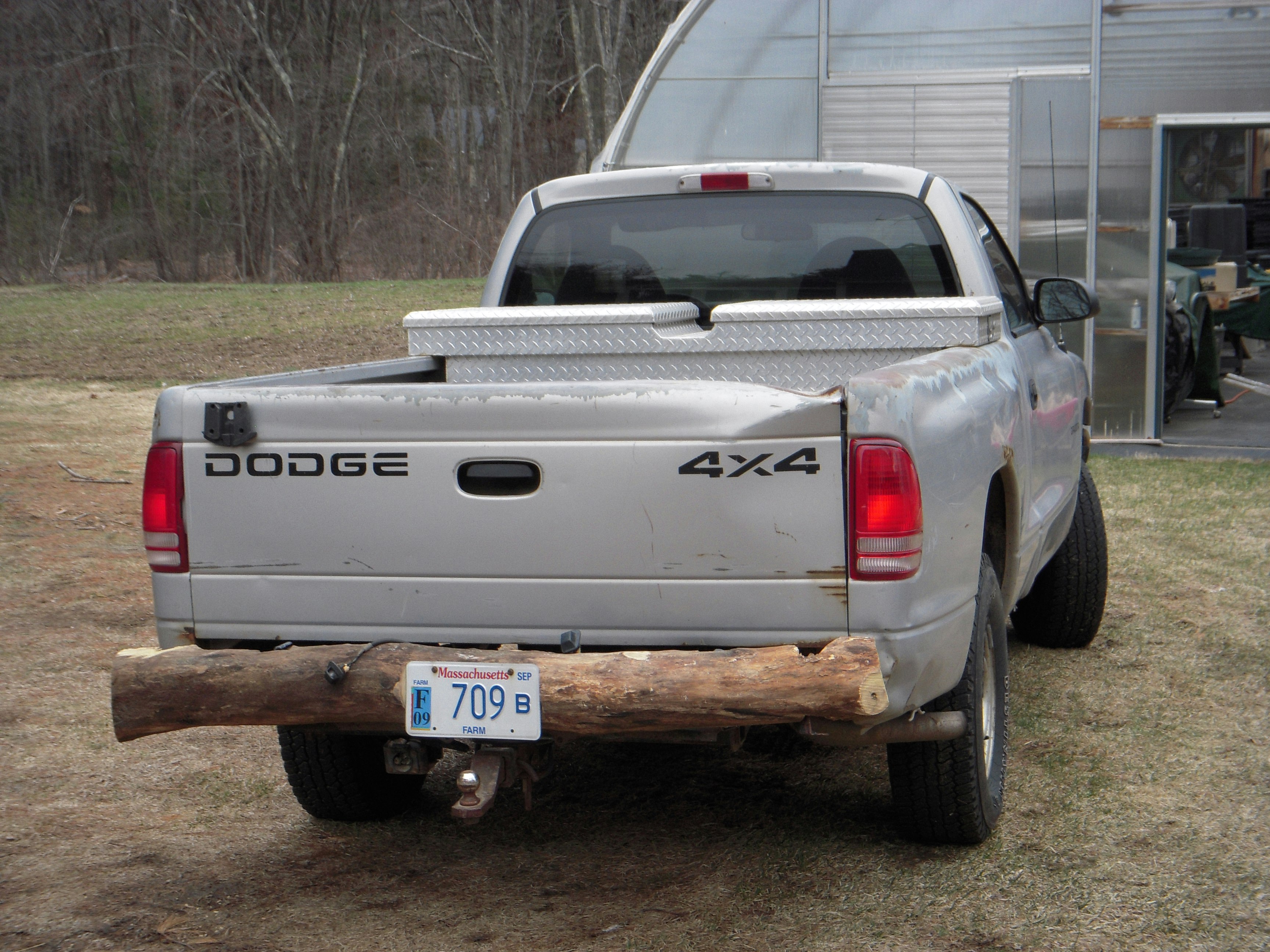 An image of a truck with a log for a bumper.